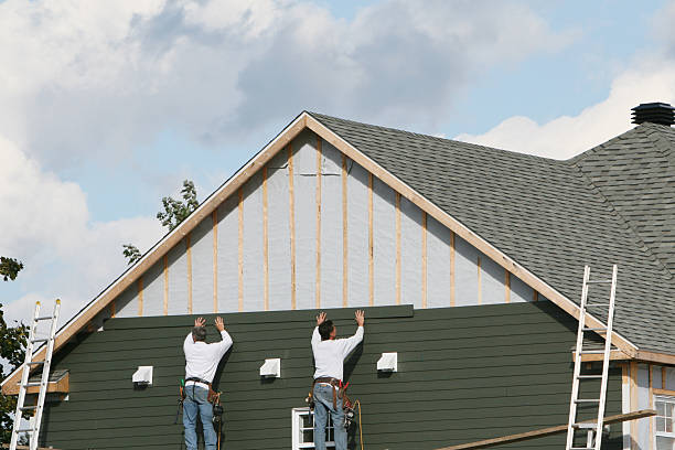 Professional Storm Damage Siding Repair technician working in Melbourne Beach, FL